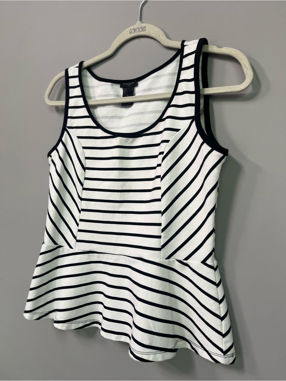 Stretchy cotton-blend peplum tank